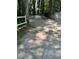 Gravel driveway providing access to the property at 4654 Hope Springs Rd, Stone Mountain, GA 30083