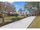 Front view of the house with a long driveway at 701 Daniel Ave, Decatur, GA 30032