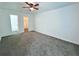 Large bedroom with ceiling fan and walk-in closet at 798 Windchase Ln, Stone Mountain, GA 30083