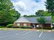 Brick community building with ample parking at 798 Windchase Ln, Stone Mountain, GA 30083