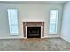 Brick fireplace with tiled hearth, adding warmth and charm to the living space at 798 Windchase Ln, Stone Mountain, GA 30083