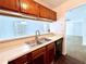 Kitchen with double sink and dishwasher at 798 Windchase Ln, Stone Mountain, GA 30083