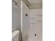 This shower features a molded shelf and a handheld shower wand at 1581 Wesley Nw Way, Conyers, GA 30012