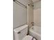 This bathroom features an updated commode and shower at 1581 Wesley Nw Way, Conyers, GA 30012
