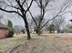 This is a large lot with a combination of bare dirt and grass at 1581 Wesley Nw Way, Conyers, GA 30012