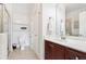 Bathroom featuring a glass enclosed shower, tile floors, and floating shelving at 2732 Wander Ln, Alpharetta, GA 30022