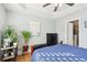Bright bedroom with neutral walls, light hardwood floors, and ample sunlight at 2732 Wander Ln, Alpharetta, GA 30022