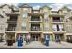 Multi-story condo building with attached garages and balconies at 2732 Wander Ln, Alpharetta, GA 30022
