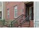 Close-up of the brick front entrance with black railing and visible house number at 2732 Wander Ln, Alpharetta, GA 30022