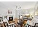 Bright living room featuring hardwood floors, fireplace, and comfortable seating at 2732 Wander Ln, Alpharetta, GA 30022