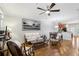 Inviting living room with hardwood floors, ceiling fan, and stylish furniture at 2732 Wander Ln, Alpharetta, GA 30022