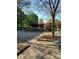 Scenic outdoor patio featuring a tiered fountain and beautiful landscaping at 2732 Wander Ln, Alpharetta, GA 30022