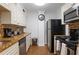 Updated kitchen featuring granite countertops and stainless steel appliances at 300 Peachtree St # 24-I, Atlanta, GA 30305