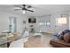 Bright living room with hardwood floors and ample seating at 300 Peachtree St # 24-I, Atlanta, GA 30305
