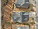 Birds eye view of the houses with landscaped yards, trees and lush greenery surrounding the homes at 1545 Camden Cove Dr, Cumming, GA 30040