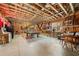 Unfinished basement showcasing an open ceiling, exposed walls and pool table at 1545 Camden Cove Dr, Cumming, GA 30040