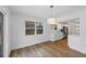 Dining area next to the kitchen with stainless steel appliances and a large window at 1630 Acworth Due West Nw Rd, Kennesaw, GA 30152