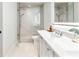 Sleek bathroom featuring a glass shower, a modern vanity with double sinks at 2575 Peachtree Ne Rd # 6G, Atlanta, GA 30305
