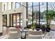 Bright lobby with floor-to-ceiling windows and comfortable seating, creating an inviting and stylish entrance at 2575 Peachtree Ne Rd # 6G, Atlanta, GA 30305