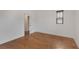 Simple bedroom with hardwood floors and an ensuite bathroom at 3018 Eamont Ter, Atlanta, GA 30328