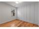 Bright bedroom with hardwood floors and board and batten wall at 3018 Eamont Ter, Atlanta, GA 30328