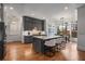 Modern kitchen with gray cabinetry, quartz countertops, and stainless steel appliances at 3018 Eamont Ter, Atlanta, GA 30328