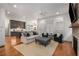 Open living space with hardwood floors and kitchen view at 3018 Eamont Ter, Atlanta, GA 30328