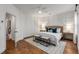 Spacious main bedroom with hardwood floors and neutral decor at 3018 Eamont Ter, Atlanta, GA 30328