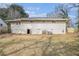 Large backyard featuring a partial view of the home's rear exterior at 2318 Ousley Ct, Decatur, GA 30032