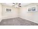 Bedroom featuring natural light from two windows and a ceiling fan at 2318 Ousley Ct, Decatur, GA 30032