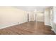 Spacious living room with new flooring, neutral walls, and natural light at 2318 Ousley Ct, Decatur, GA 30032