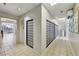Well-lit hallway with mailboxes and tiled flooring, leading to a bright outdoor view at 2479 Peachtree Ne Rd # 1012, Atlanta, GA 30305