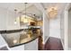 Open kitchen with granite counters, stainless appliances, and pendant lighting at 2479 Peachtree Ne Rd # 1012, Atlanta, GA 30305