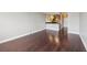 Spacious room with hardwood floors leading into kitchen area at 2479 Peachtree Ne Rd # 1012, Atlanta, GA 30305