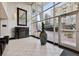 Bright lobby with decorative mirror, comfortable seating, and greenery creates a welcoming first impression at 2479 Peachtree Ne Rd # 1012, Atlanta, GA 30305