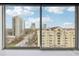 City view from the window with high-rise buildings under a clear blue sky at 2479 Peachtree Ne Rd # 1012, Atlanta, GA 30305