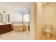 Main bathroom with a bathtub, shower, and toilet at 3120 Esplanade Sw Cir, Atlanta, GA 30311