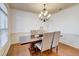 Formal dining room with hardwood floors and large windows at 3120 Esplanade Sw Cir, Atlanta, GA 30311