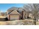 Two-story house with a two-car garage and large yard at 3120 Esplanade Sw Cir, Atlanta, GA 30311