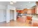 Spacious kitchen features wood cabinets, a center island, and a walk in pantry at 3120 Esplanade Sw Cir, Atlanta, GA 30311