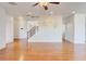 Open concept living room with hardwood floors and a decorative wall at 3120 Esplanade Sw Cir, Atlanta, GA 30311