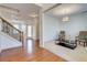 Elegant living room features a staircase and cozy seating area with modern decor at 3120 Esplanade Sw Cir, Atlanta, GA 30311