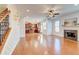 Spacious living room with a fireplace and seamless flow into the kitchen area at 3120 Esplanade Sw Cir, Atlanta, GA 30311