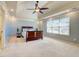 Relaxing bedroom with tray ceilings, ceiling fan, and soft color palette at 3120 Esplanade Sw Cir, Atlanta, GA 30311