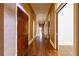 Elegant hallway with hardwood floors and rich wood doors at 3450 Ridgewood Nw Rd, Atlanta, GA 30327