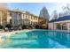 Luxury estate home with a large circular pool and pool house at 3450 Ridgewood Nw Rd, Atlanta, GA 30327