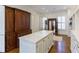 Large walk-in closet with custom built-ins and island at 3450 Ridgewood Nw Rd, Atlanta, GA 30327