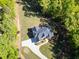 Aerial view of the property showing a well-maintained lawn and landscaping at 45 Kinloch Ct, Covington, GA 30014