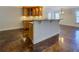 Finished basement bar with wood cabinets and modern countertops at 45 Kinloch Ct, Covington, GA 30014