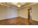 Cozy bedroom with lustrous floor and stylish lighting fixture at 45 Kinloch Ct, Covington, GA 30014